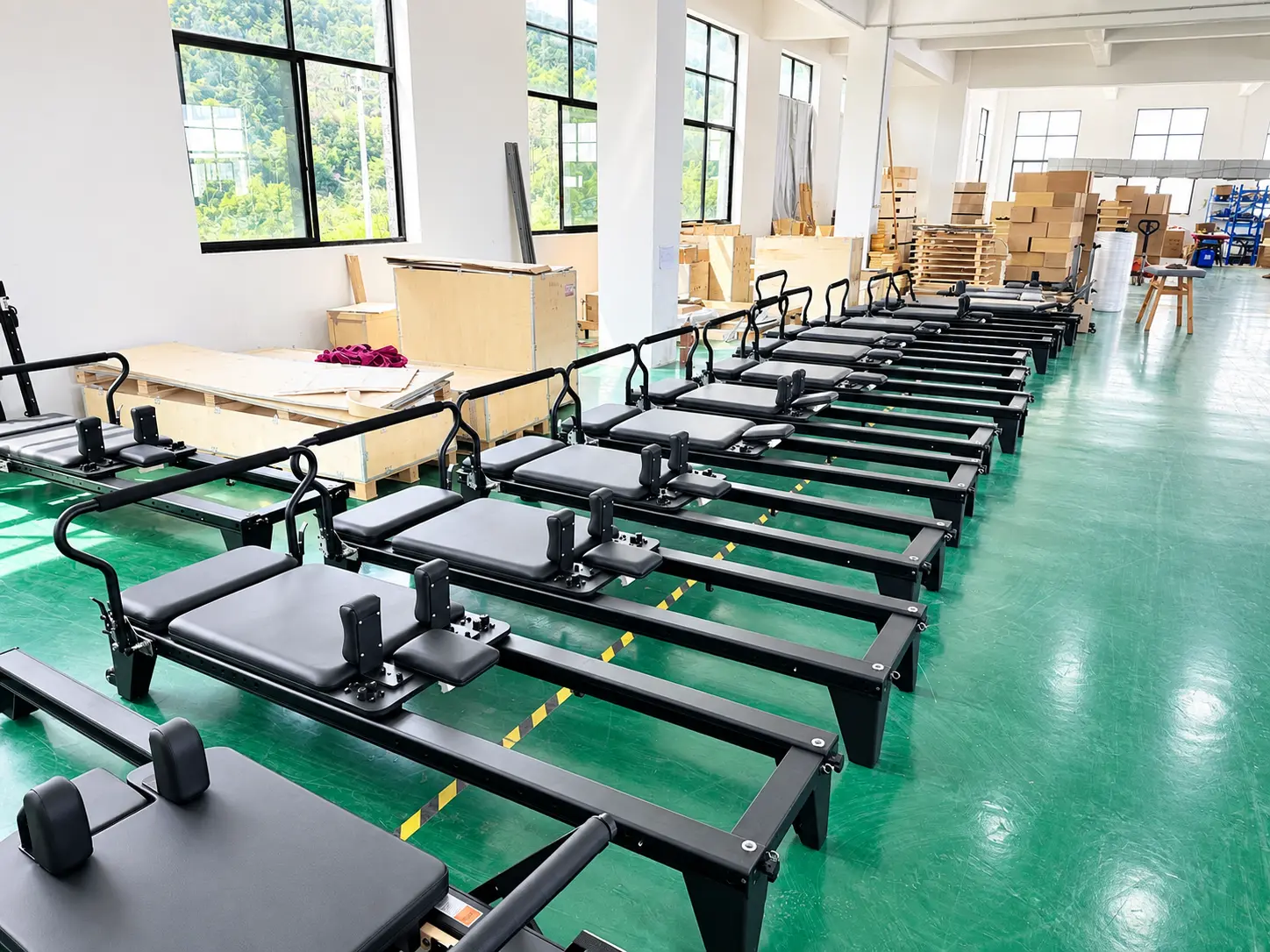 Reformer Row In A Sunlit Workshop