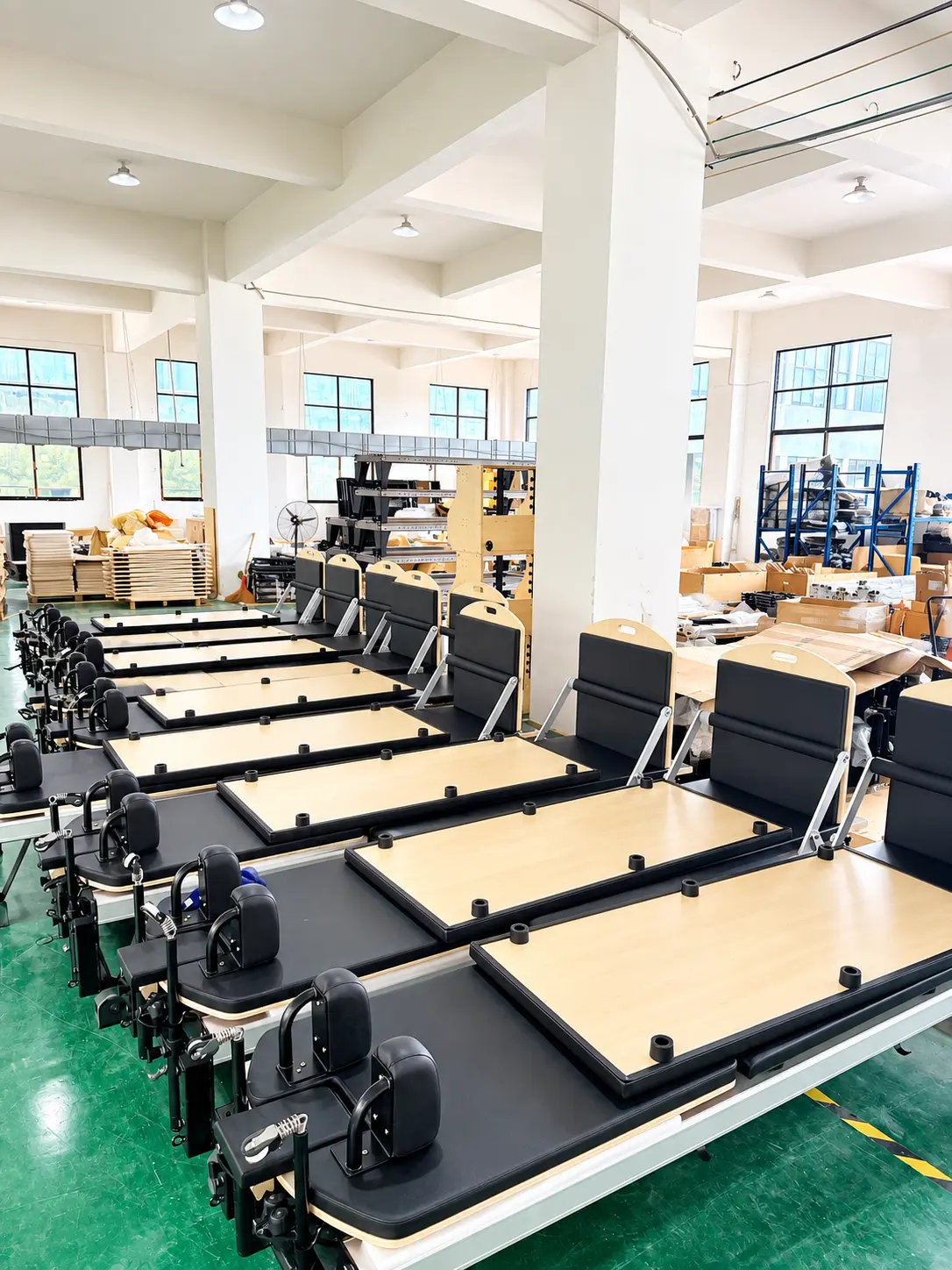 Reformer Row In A Sunlit Workshop