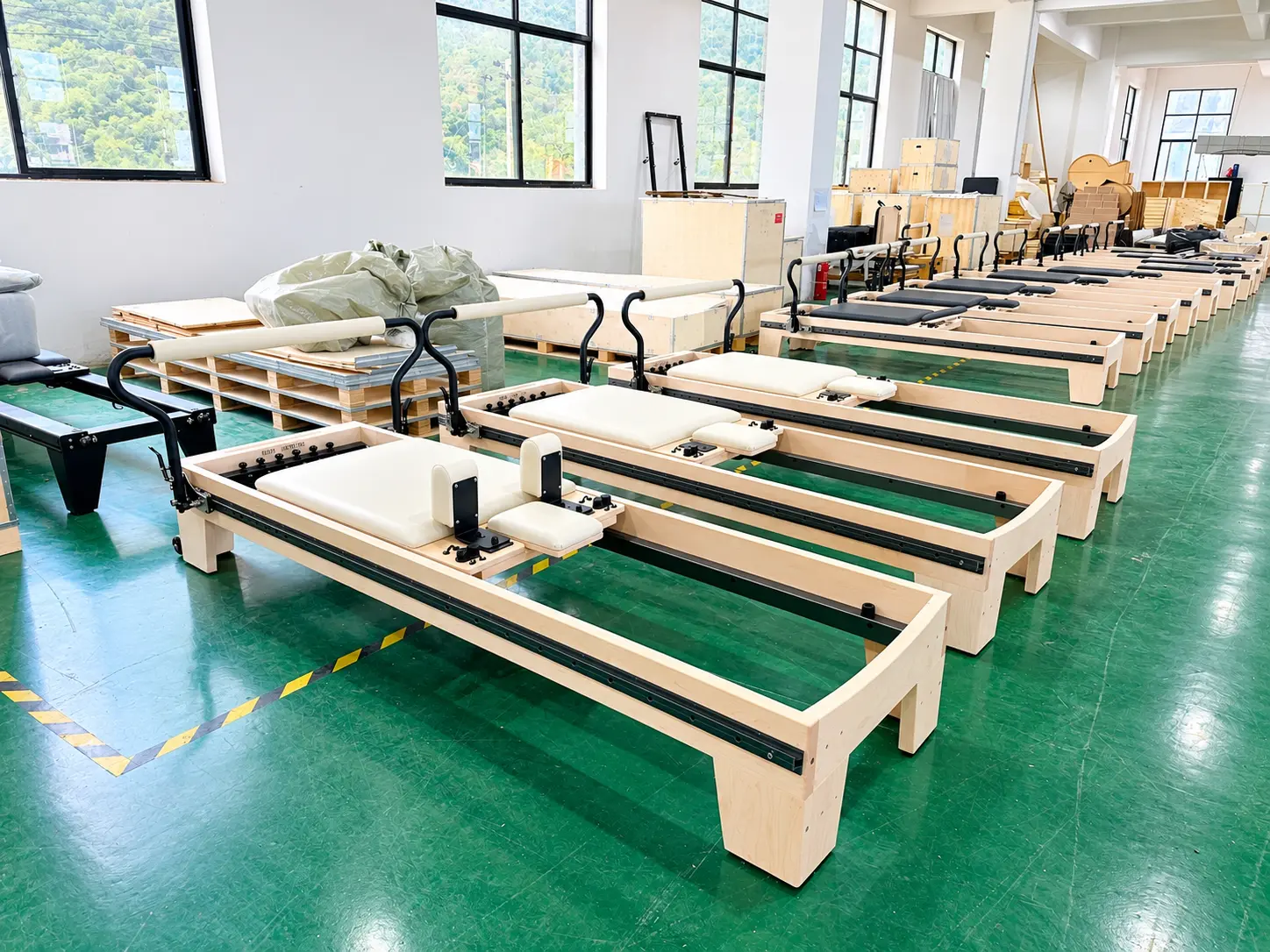 Reformer Row In A Sunlit Workshop