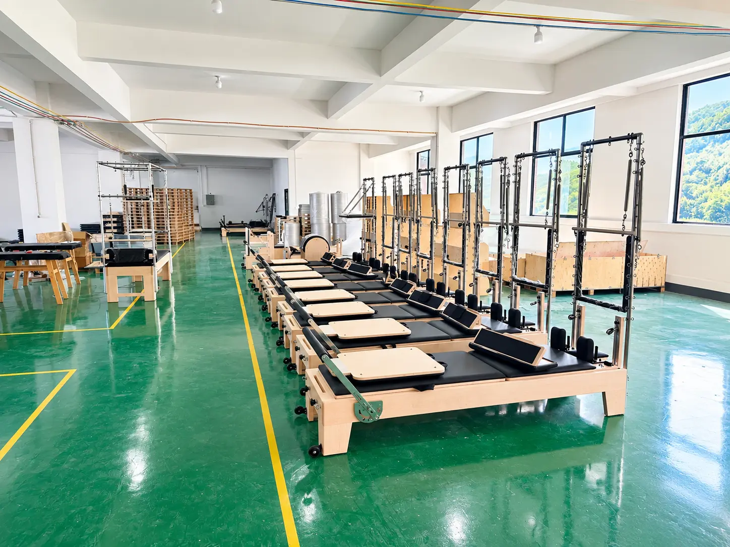 Pilates Reformers In A Bright Factory