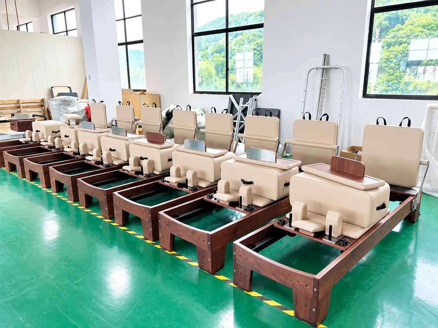 Reformer Row In A Sunlit Workshop
